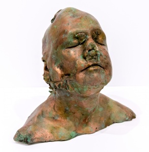 bronze sculpture of a person's head and shoulders, with head lifted up with eyes closed